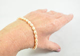 Warm pink freshwater pearl bracelet by Sarah Beevers