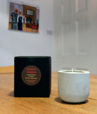Stylish concrete pots with seasonal hand-poured candles by Carlos Dominguez