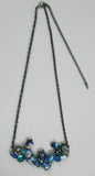 Blue sparkling Rococco 'Bower' necklace by Annie Sherberne