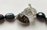 Iridescent blue grey freshwater pearl necklace by Sarah Beevers
