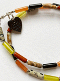 Multi-stone semi-precious necklace in warm colours by Sarah Beevers