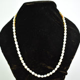Tones of pink and white long freshwater pearl necklace by Sarah Beevers