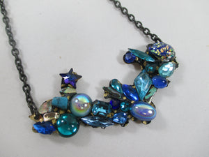 Blue sparkling Rococco 'Bower' necklace by Annie Sherberne