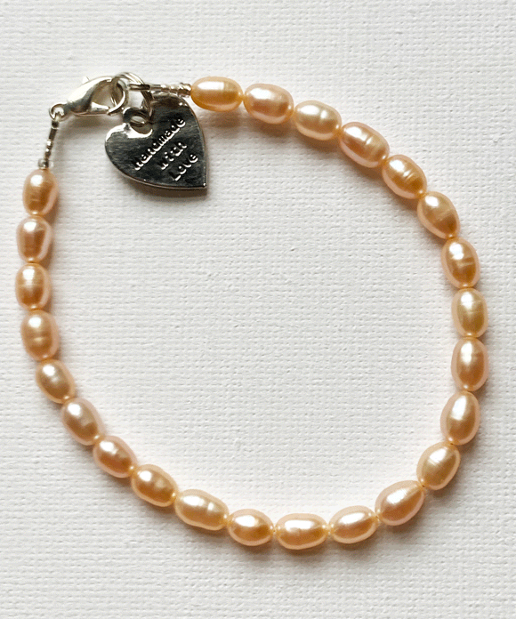 Warm pink freshwater pearl bracelet by Sarah Beevers