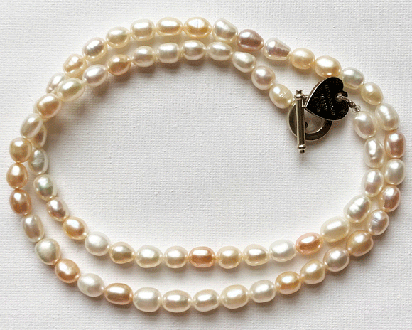 Tones of pink and white long freshwater pearl necklace by Sarah Beevers