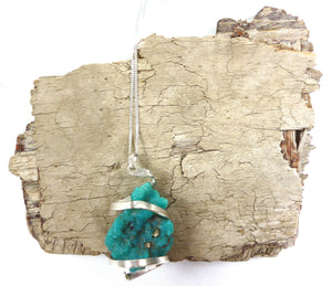 Hammered 'eco' silver coil with raw turquoise stone pendant by Ella Wood at One Green